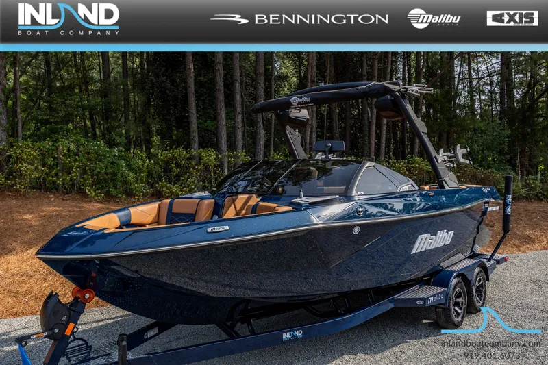 Slide: The Image of 2026 Malibu Wakesetter 23 LSV boat on trailer outdoors. - 13