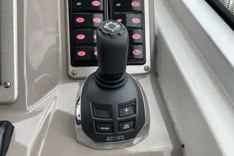 Slide: The Image of Joystick control panel on a 2008 Cruisers Yachts 390 Express Coupe. - 22