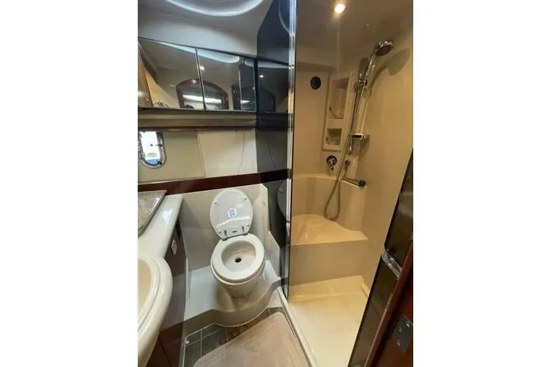 Slide: The Image of Bathroom interior of 2008 Cruisers Yachts 390 Express Coupe with shower and toilet. - 51