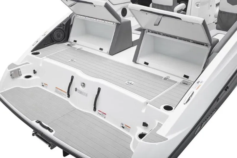 Slide: The Image of 2026 Yamaha Boats AR250 swim platform with storage compartments open. - 11