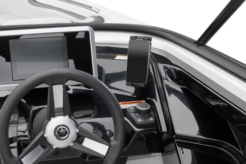 Slide: The Image of 2026 Yamaha AR250 boat dashboard with steering wheel and digital display. - 4