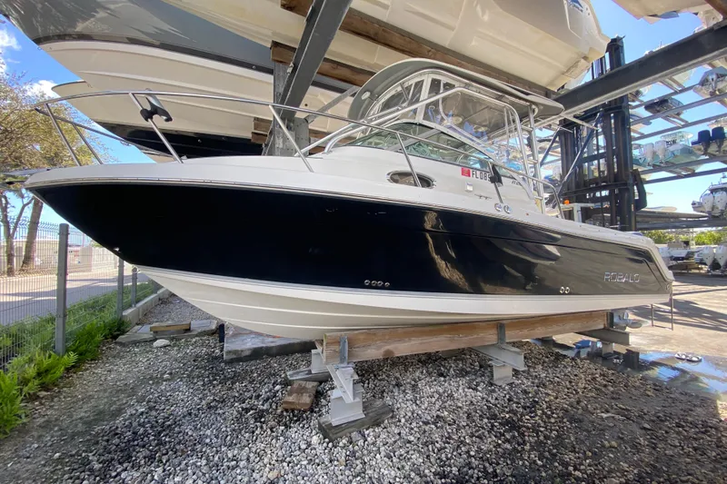 The Image of 2007 Robalo R265 Walkaround boat on dry dock, side view. - 0