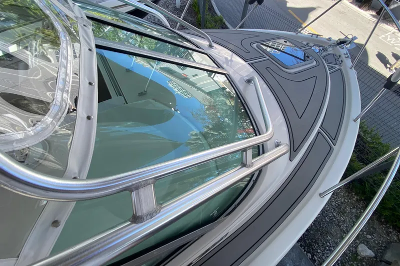 Slide: The Image of 2007 Robalo R265 Walkaround boat with sleek design and stainless steel railings. - 20