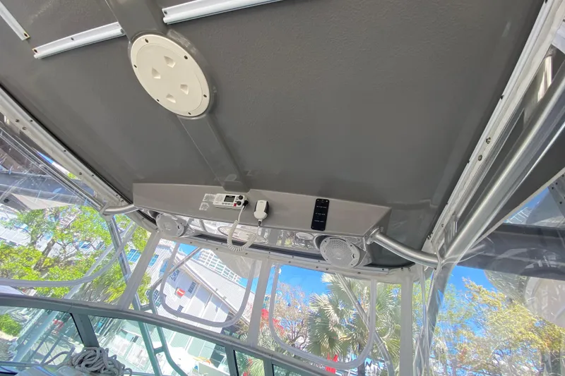 Slide: The Image of 2007 Robalo R265 Walkaround boat interior with electronics and speakers, viewed from below. - 36