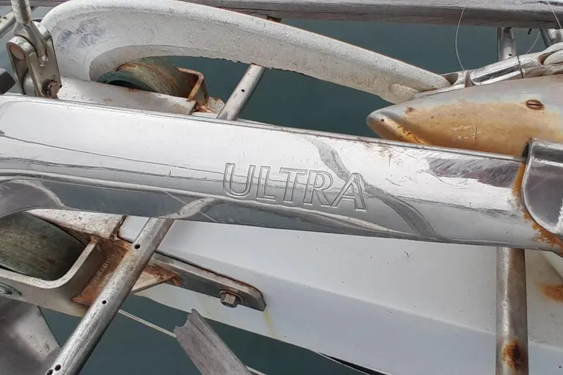 Slide: The Image of Close-up of a 1974 Force Hudson 50 boat anchor with "ULTRA" engraved. - 52