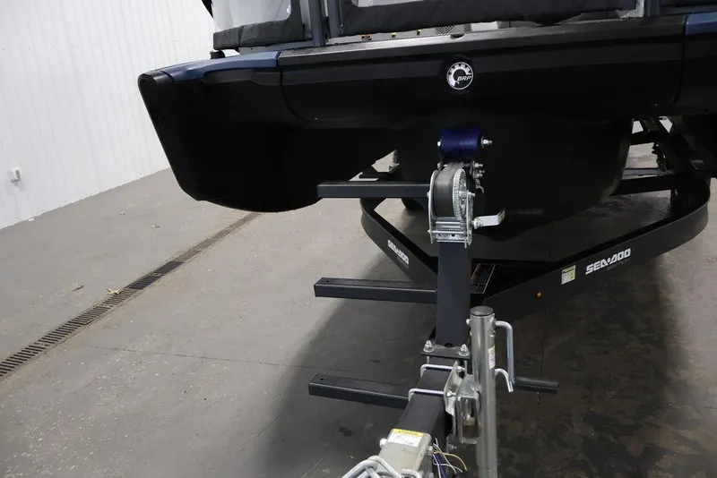 Slide: The Image of 2025 Sea-Doo Switch Cruise 21 on trailer in indoor storage facility. - 29