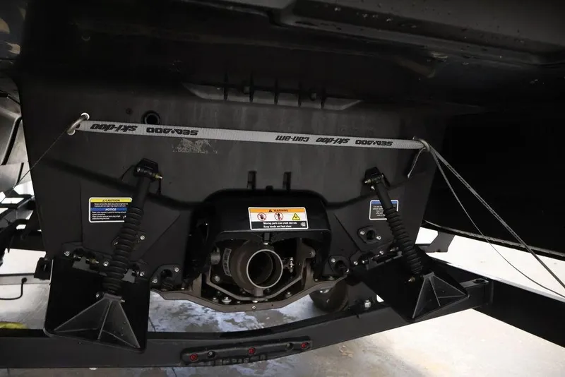 Slide: The Image of Underneath view of 2025 Sea-Doo Switch Cruise 21, showcasing mechanical components. - 31