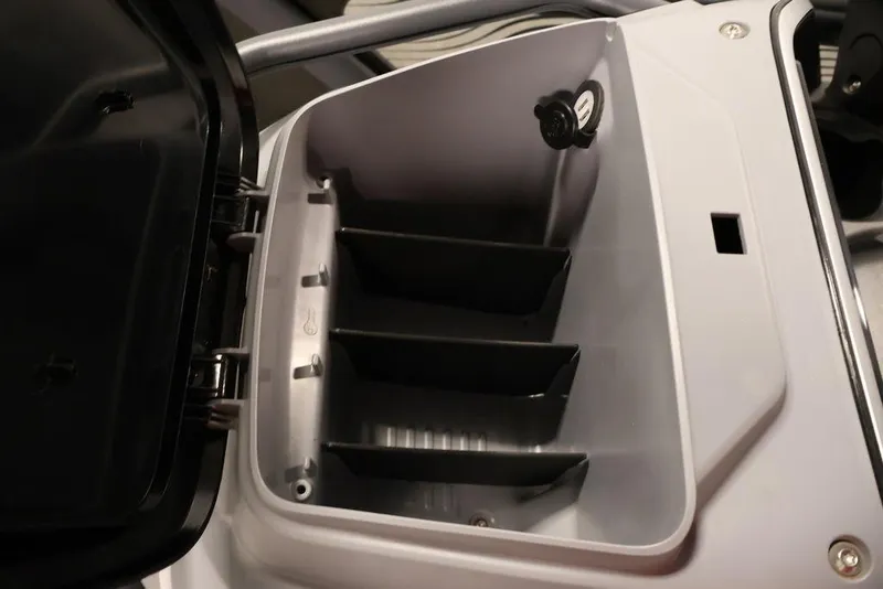 Slide: The Image of Storage compartment of 2025 Sea-Doo Switch Cruise 21, featuring organized interior space. - 15