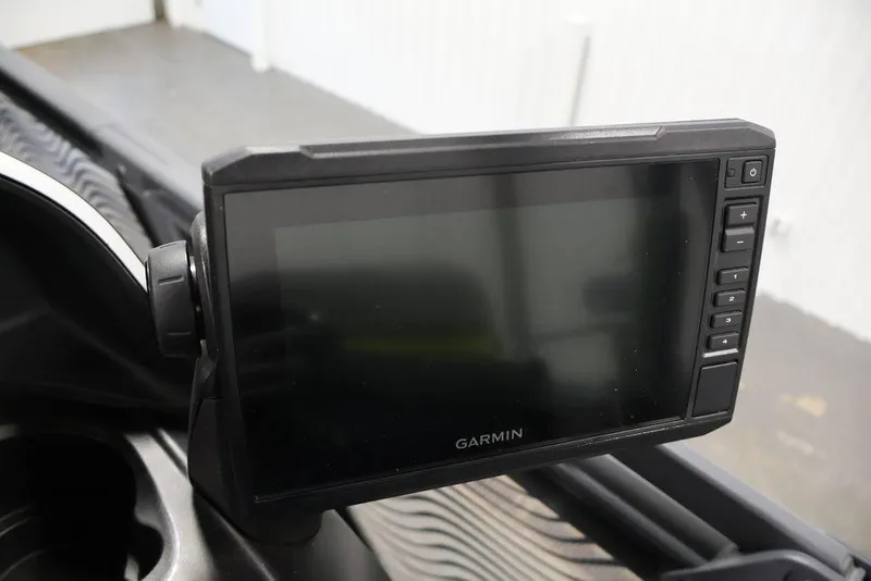 Slide: The Image of Garmin display on 2025 Sea-Doo Switch Cruise 21 dashboard, featuring control buttons. - 16