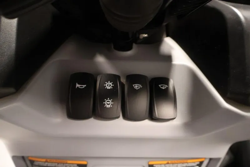 Slide: The Image of Control panel of 2025 Sea-Doo Switch Cruise 21 with four switches. - 17