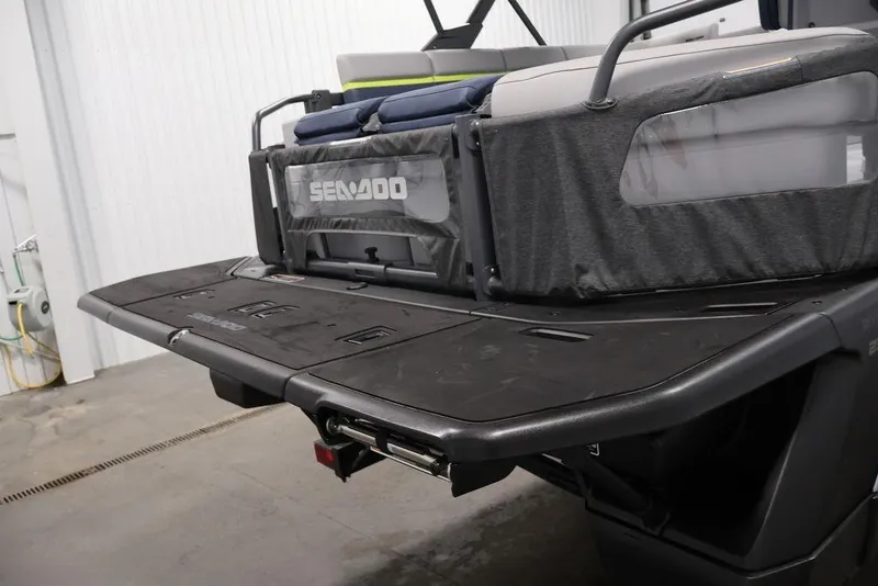 Slide: The Image of 2025 Sea-Doo Switch Cruise 21 rear view, showcasing deck and seating area. - 24