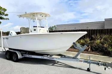 Slide: The Image of 2023 Sea Pro 219 Center Console boat on trailer, parked outdoors. - 10