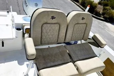 Slide: The Image of 2023 Sea Pro 219 Center Console boat seats with armrests and diamond stitching. - 4