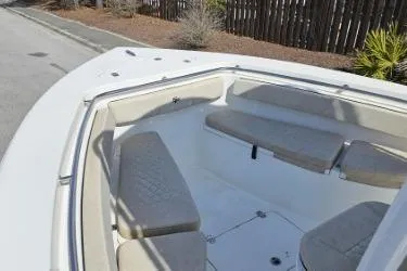 Slide: The Image of 2023 Sea Pro 219 Center Console boat with spacious seating area. - 5