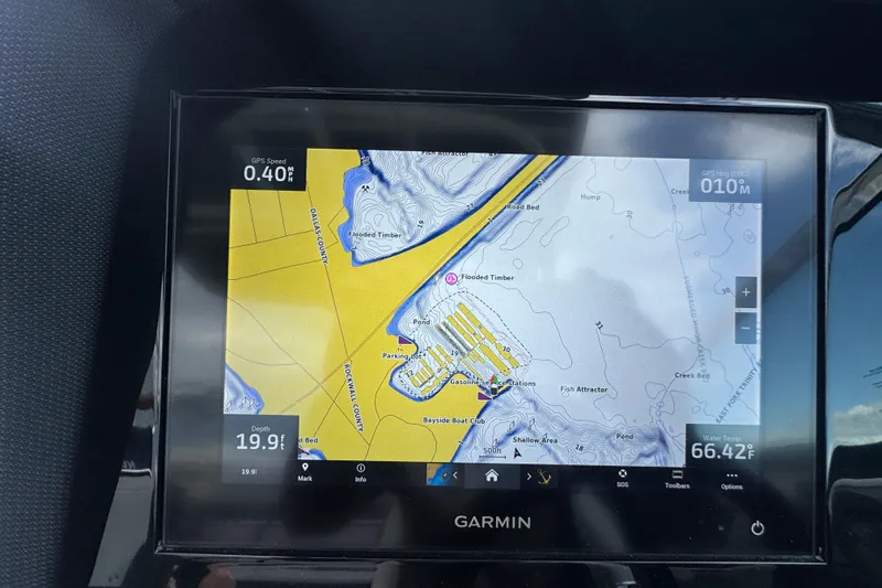 Slide: The Image of Garmin navigation display on 2023 Cobalt R4, showing detailed waterway map and GPS data. - 17