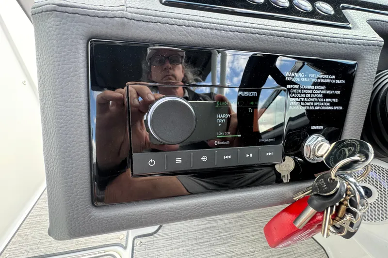 Slide: The Image of 2023 Cobalt R4 dashboard with Fusion stereo system and ignition keys. - 19