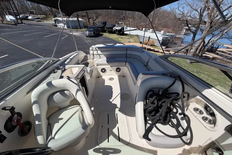 Slide: The Image of Interior of a 2008 Bryant 268 boat with seating and ropes. - 11