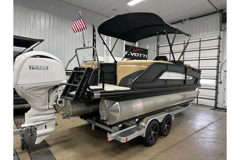 Slide: The Image of 2026 Evotti 521QL pontoon boat with Yamaha engine in a showroom. - 17
