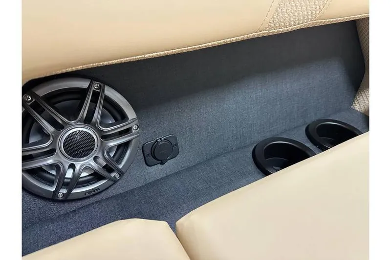 Slide: The Image of Evotti 521QL 2026 interior with speaker, USB port, and cup holders. - 24