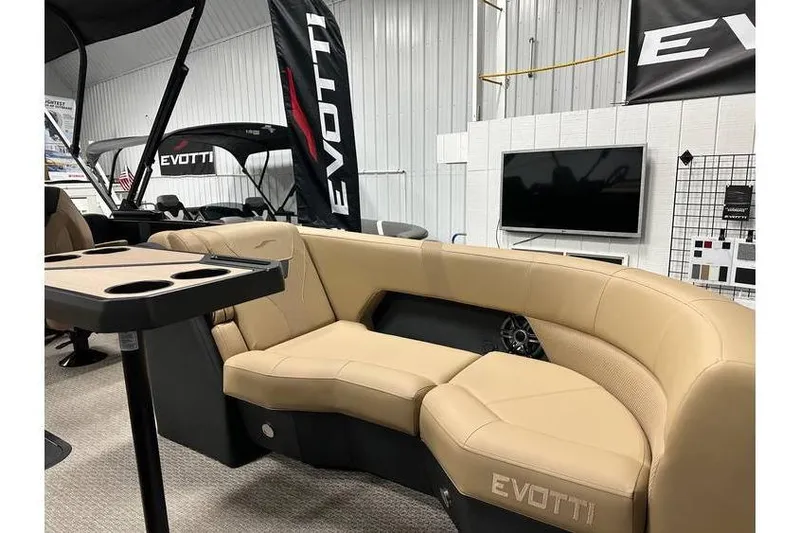 Slide: The Image of Luxurious Evotti 521QL 2026 boat interior with beige seating and modern amenities. - 25