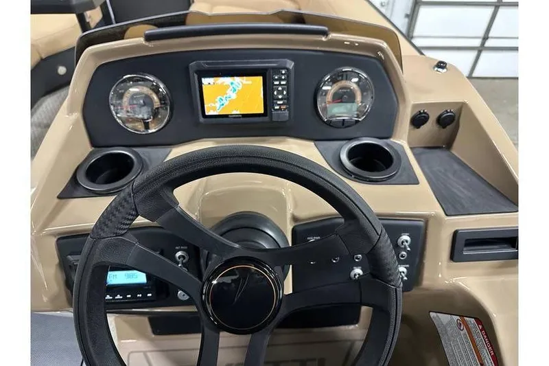 Slide: The Image of Dashboard of 2026 Evotti 521QL boat with steering wheel and navigation display. - 27