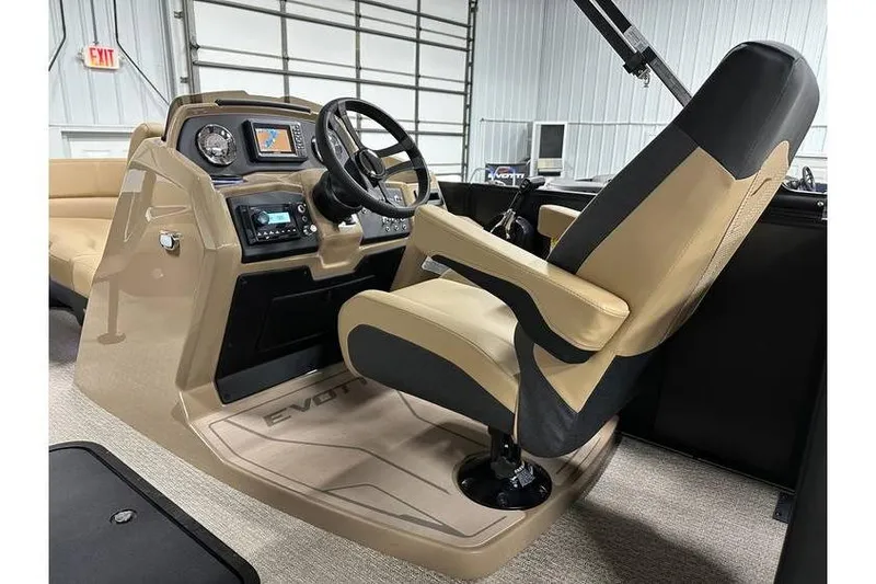 Slide: The Image of Captain's chair and dashboard of 2026 Evotti 521QL boat in a showroom. - 34