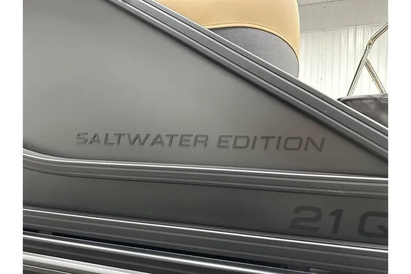 Slide: The Image of 2026 Evotti 521QL Saltwater Edition boat detail with sleek design elements. - 42