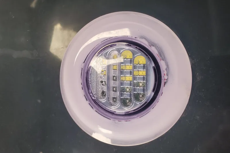 Slide: The Image of Close-up of a Boston Whaler Challenger 1989 boat light fixture. - 34