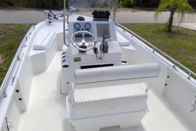The Image of 2007 Tidewater 216 CC Adventure boat interior with steering console and seating. - 0