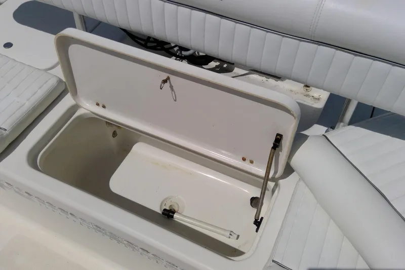 Slide: The Image of Open storage compartment on a 2007 Tidewater 216 CC Adventure boat. - 26