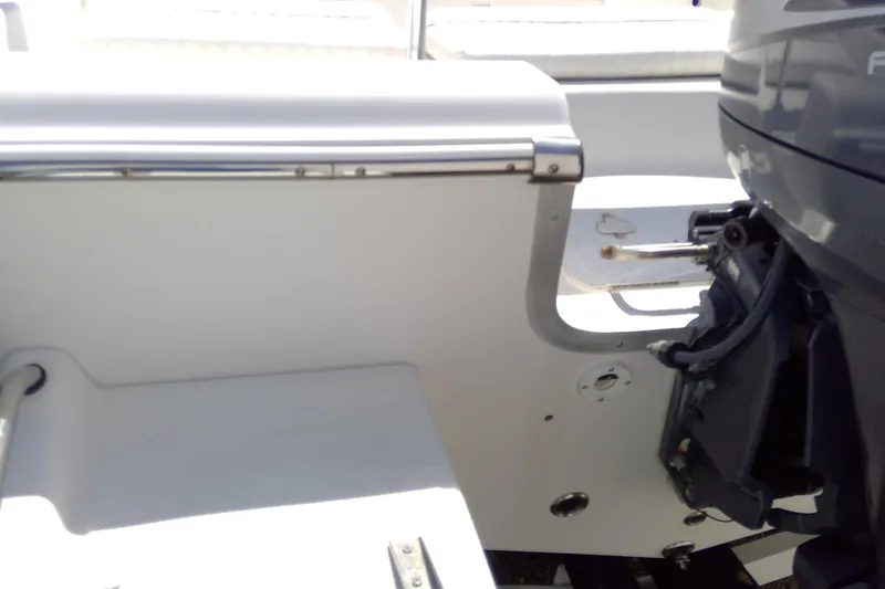 Slide: The Image of 2007 Tidewater 216 CC Adventure boat interior with visible engine components. - 31