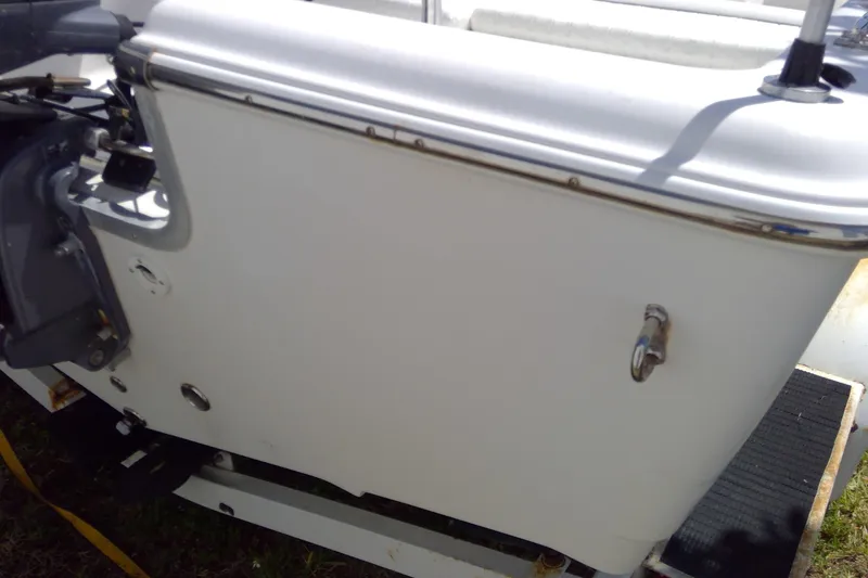 Slide: The Image of 2007 Tidewater 216 CC Adventure boat transom with motor mount and hardware. - 32