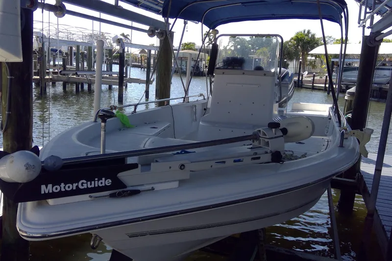 Slide: The Image of 2007 Tidewater 216 CC Adventure boat docked with MotorGuide trolling motor. - 6
