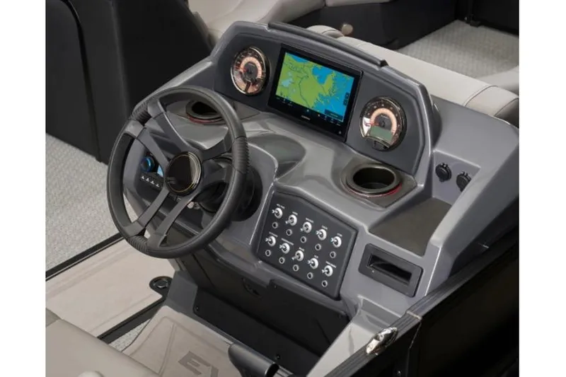 Slide: The Image of 2026 Evotti 523QL boat dashboard with steering wheel, navigation screen, and control panel. - 9