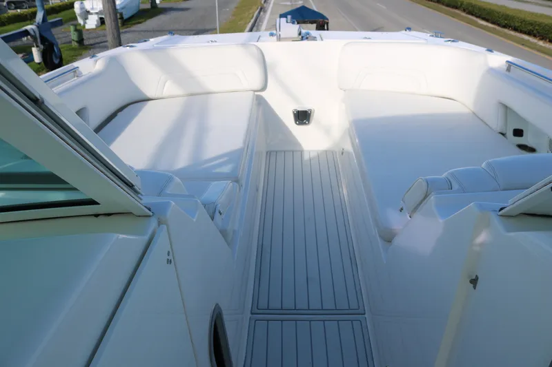 Slide: The Image of 2019 World Cat 320 DC boat interior with spacious seating and sleek design. - 6