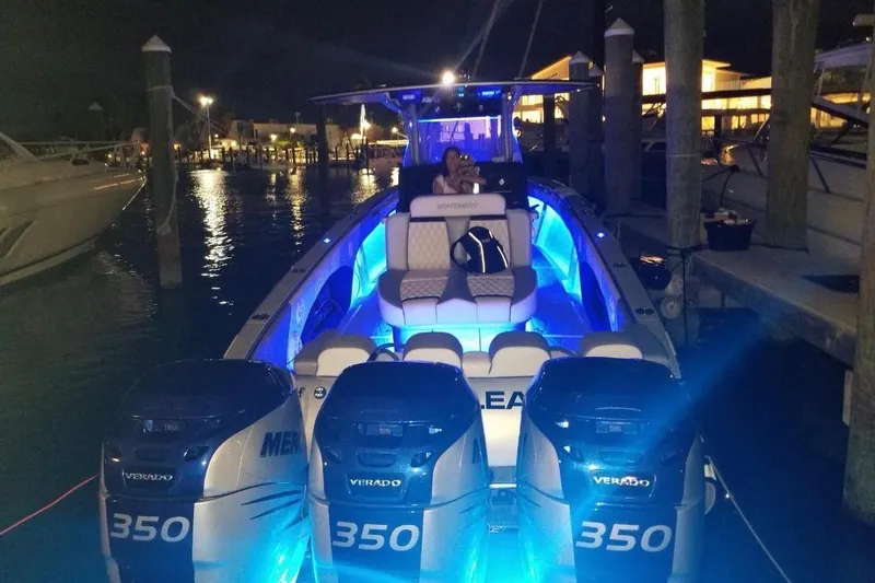 Slide: The Image of Triple Mercury outboard engines on 2019 Statement 380 Open boat in open water. - 10