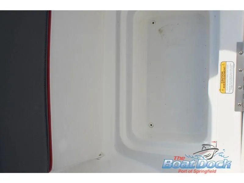 Slide: The Image of Interior of 2023 Tahoe T16 boat, white storage compartment. - 15