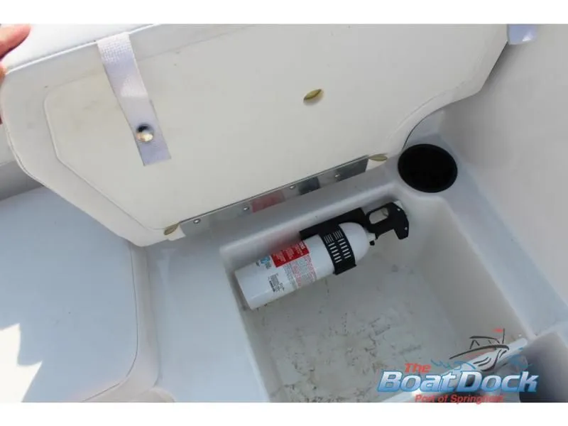 Slide: The Image of Fire extinguisher in storage compartment of 2023 Tahoe T16 boat. - 16