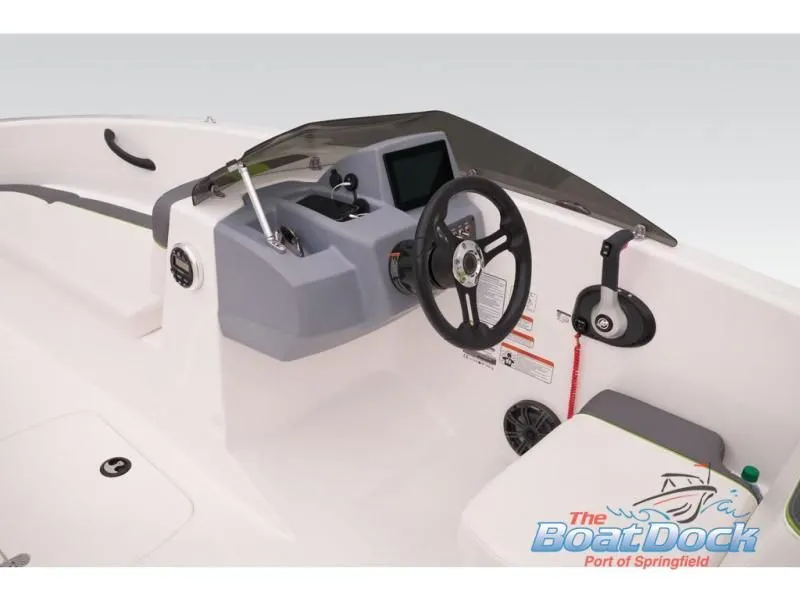 Slide: The Image of Interior view of 2023 Tahoe T16 boat cockpit with steering and instruments. - 43