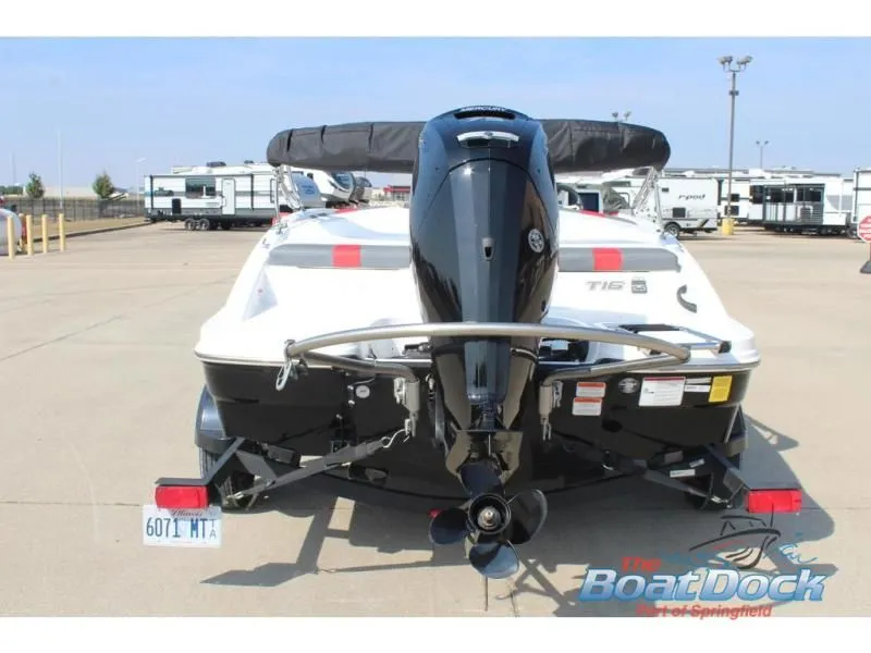 Slide: The Image of Rear view of a 2023 Tahoe T16 boat on a trailer. - 7