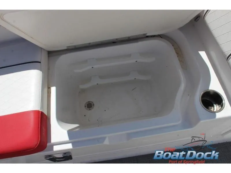 Slide: The Image of Interior of a 2022 Tahoe 2150 boat with storage compartment. - 16