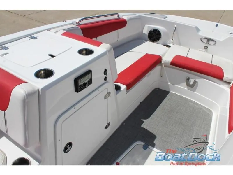 Slide: The Image of Interior of a 2022 Tahoe 2150 boat with red seating. - 18