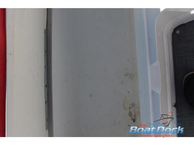 Slide: The Image of Interior of a 2022 Tahoe 2150 boat with The Boat Dock logo. - 21