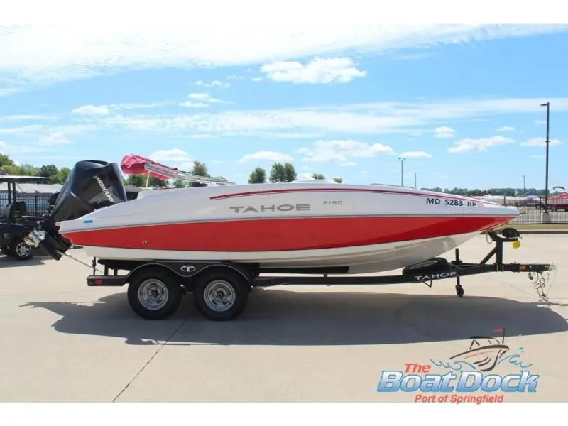 Slide: The Image of 2022 Tahoe 2150 boat on trailer, side view. - 5