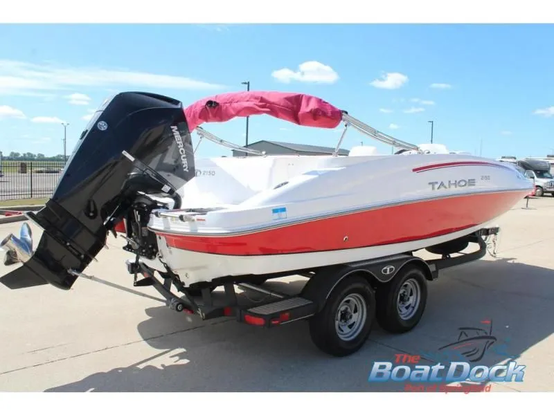 Slide: The Image of 2022 Tahoe 2150 boat on trailer, red and white design. - 6