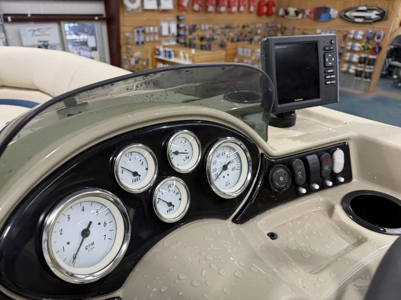 Slide: The Image of Dashboard of a 2014 Lowe SS 210 pontoon boat. - 10