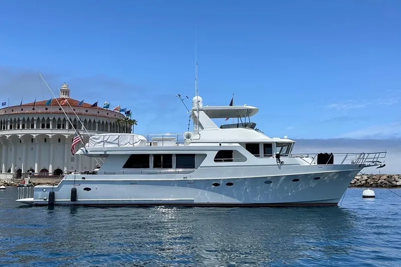 Slide: The Image of 2003 Ocean Alexander 700 Classicco yacht cruising on calm waters. - 1