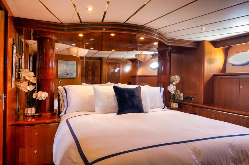 Slide: The Image of Luxurious bedroom interior of 2003 Ocean Alexander 700 Classicco yacht with elegant wood finishes. - 27