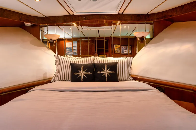 Slide: The Image of Luxurious bedroom interior of 2003 Ocean Alexander 700 Classicco yacht with nautical-themed decor. - 32