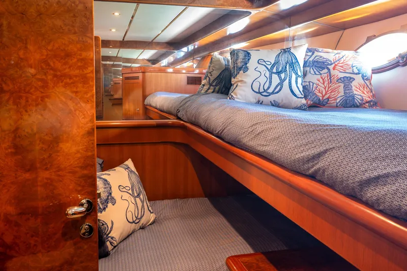 Slide: The Image of Luxurious cabin interior of 2003 Ocean Alexander 700 Classicco yacht with nautical-themed decor. - 35